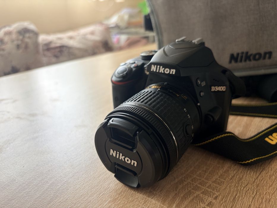 Nikon D3400 + 18-55mm , пълен комплект + подарък статив Hama