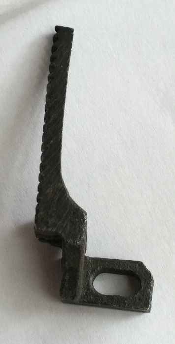 Деталь для оверлока