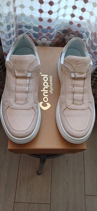 Продам кожаные кроссовки Conhpol
