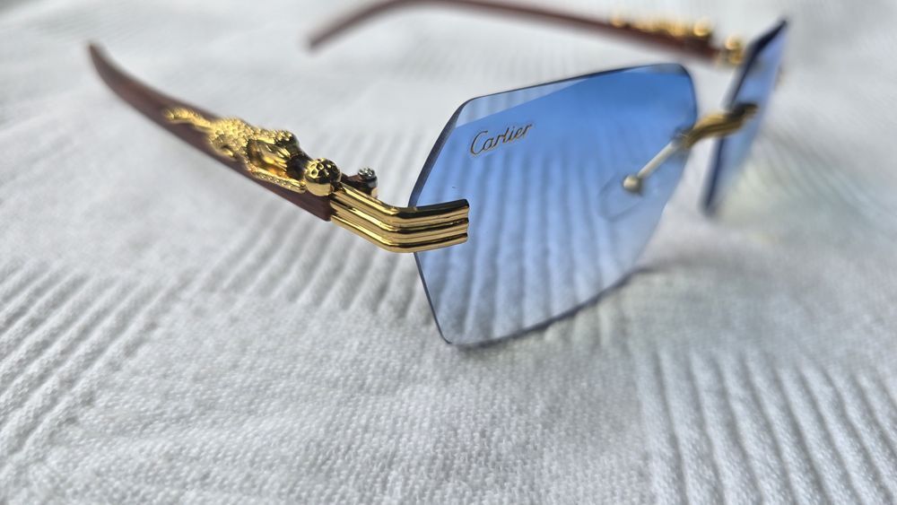 Set ochelari de soare Cartier model mic.