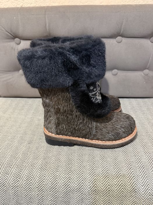 Продам унты новые