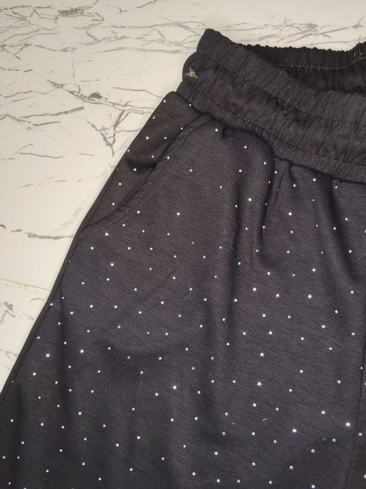 Pantaloni evazați cu pietricele de damă