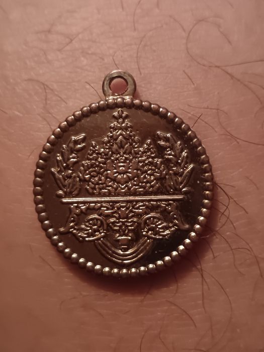 Moneda veche și pendalion