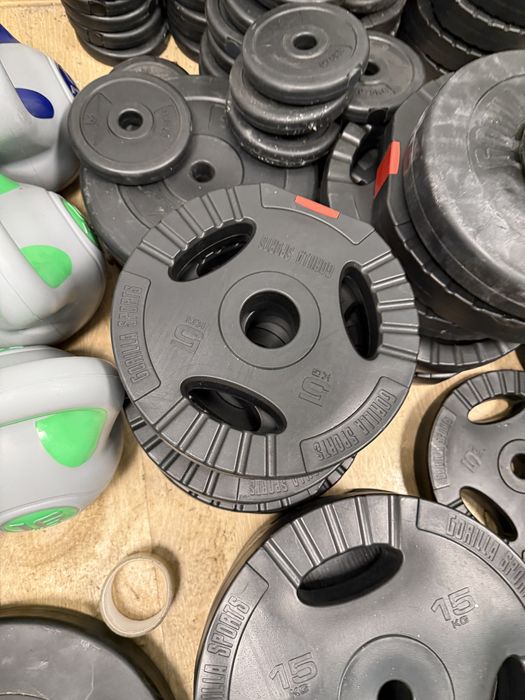 Discuri olimpice haltere si gantere 50 mm Olimpice noi pret 7 lei kg.