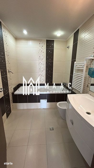 Apartamentb3 camere 2 băi ,garaj