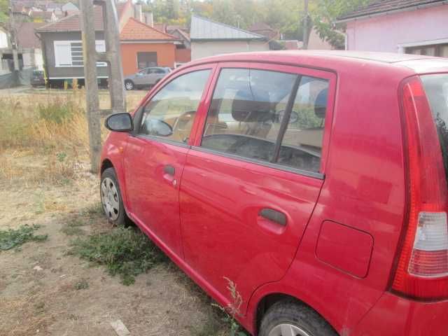 Daihatsu Cuore 2005,benzină