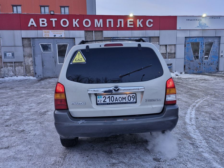 Мазда трибьют продам