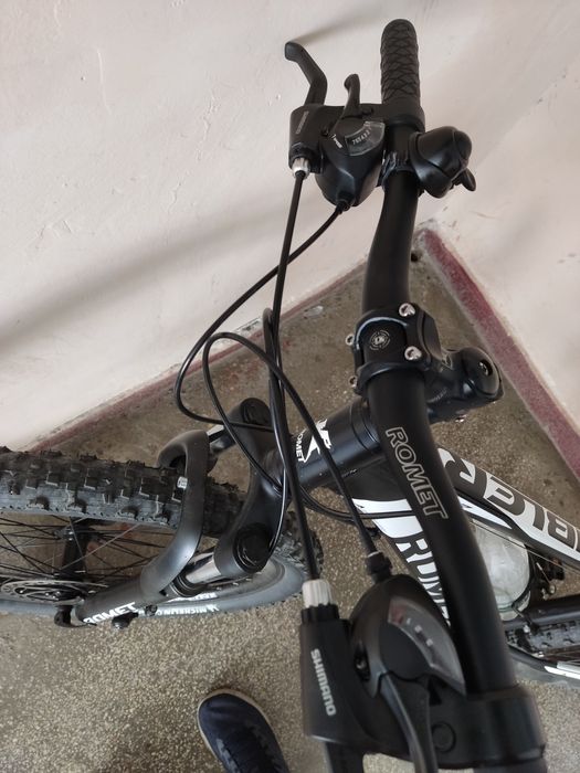 Bicicletă Romet - Shimano, cadru aluminiu, discuri față/spate, anvelop