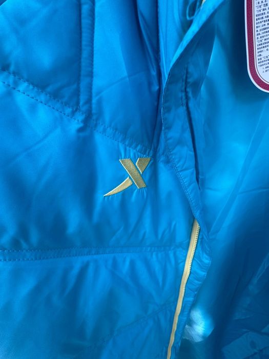 Продам пуховик мужской новый