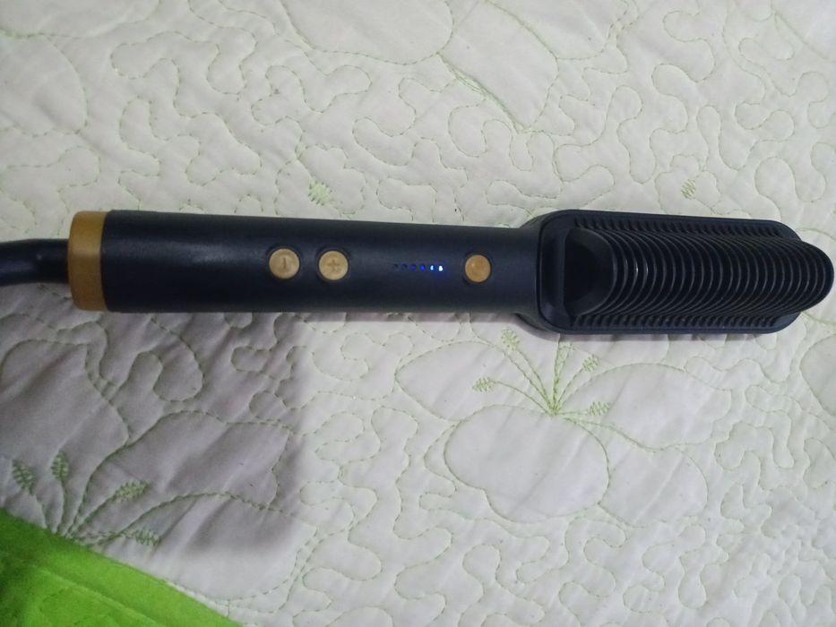 Perie de îndreptat părul