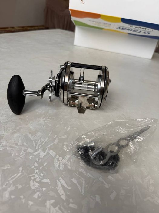 Кармок катушка спиннинг