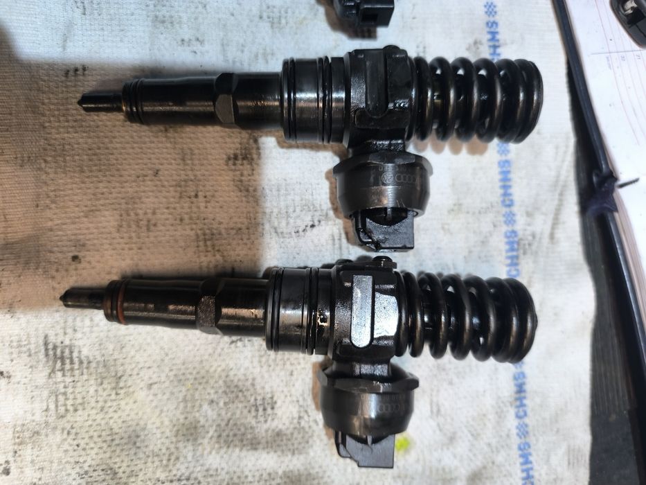 Injectoare 2.0 tdi BPW / BSS Audi A4 B7 Skoda Superb 1