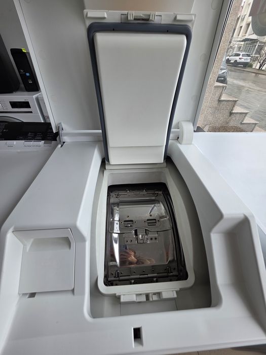 Пералня с горно зареждане Míele