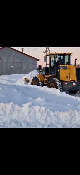 Фронтальный погрузчик.