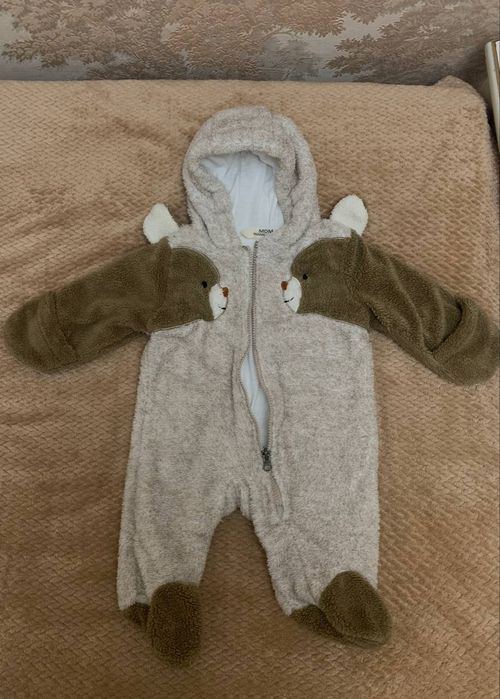 Детские вещи на новорождённых