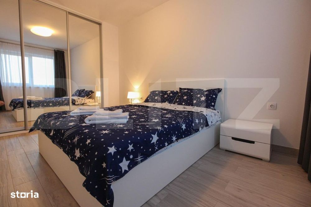 Apartament modern cu 2 camere, incalzire in pardoseala, parcare, zona