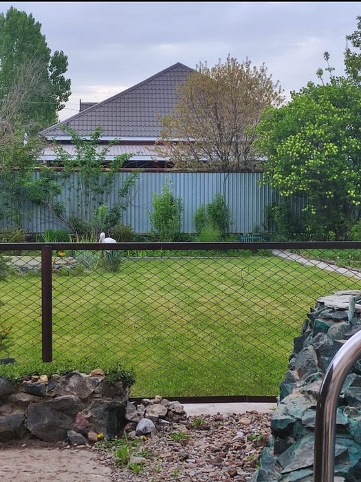 Продам дом в  черте города экологически ч