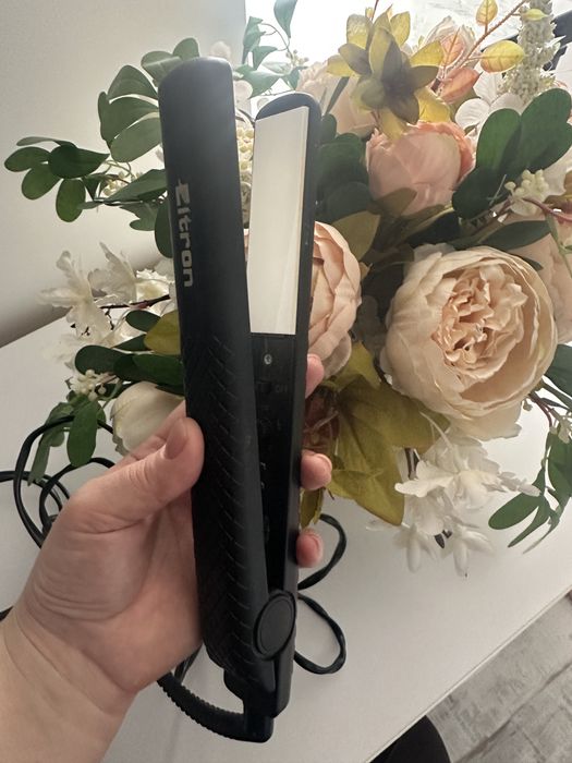 Vand placă de indreptat parul, Eltron