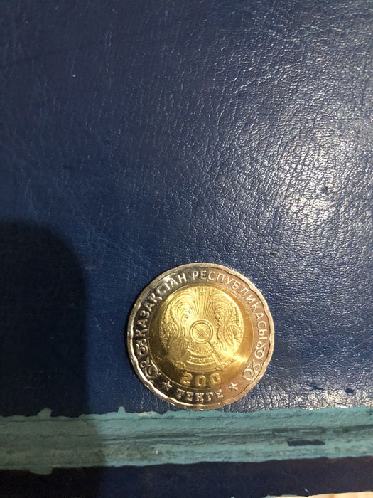 Монета 200 теңге 80 жыл