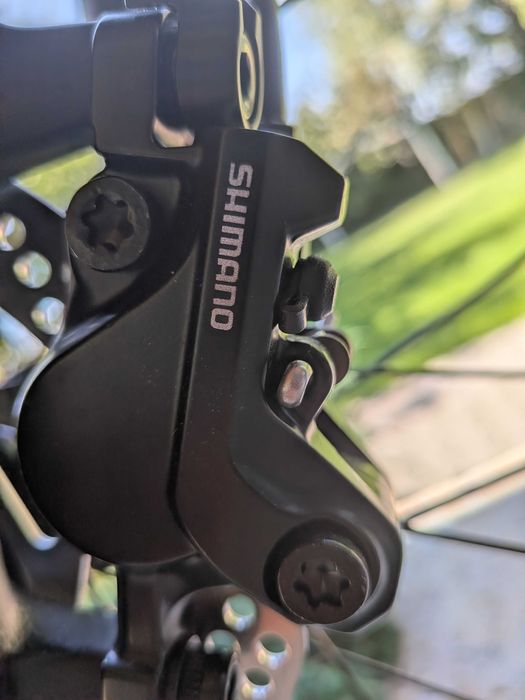 Set frane pentru bicicleta Shimano MT501 cu 2 pistoane hidraulice
