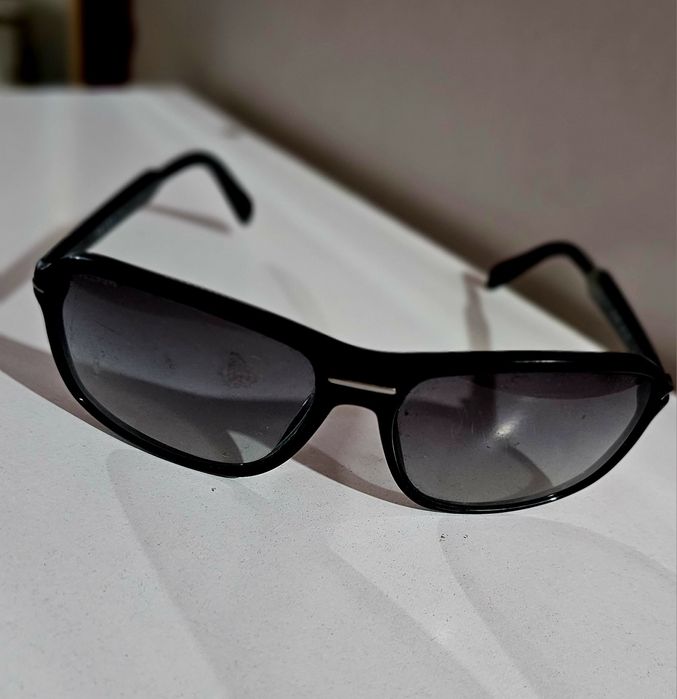 Ochelari RAI BAN și o pereche de la PRADA