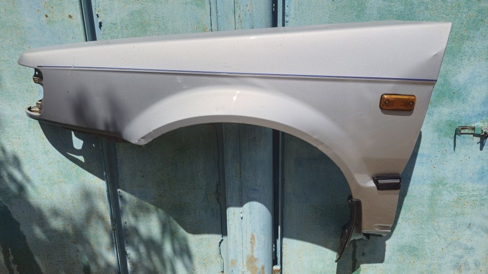 Крыло водительской стороны мазда 323