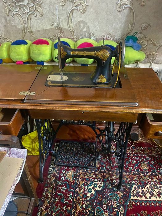 Швейная машинка .