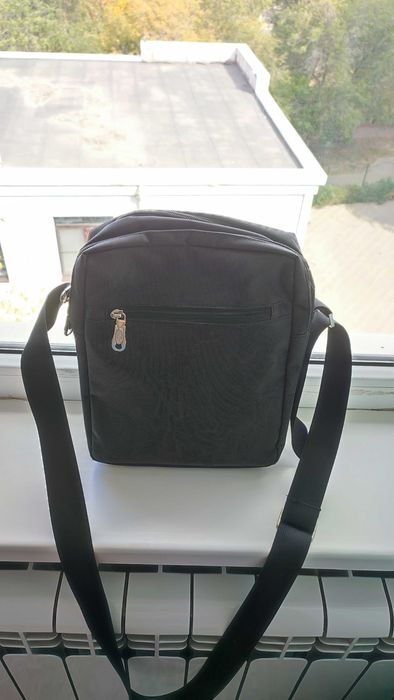 Продам качественную сумку Qidelong