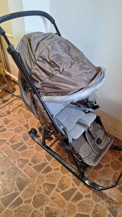 Продам универсальные детские санки с 4 колесами