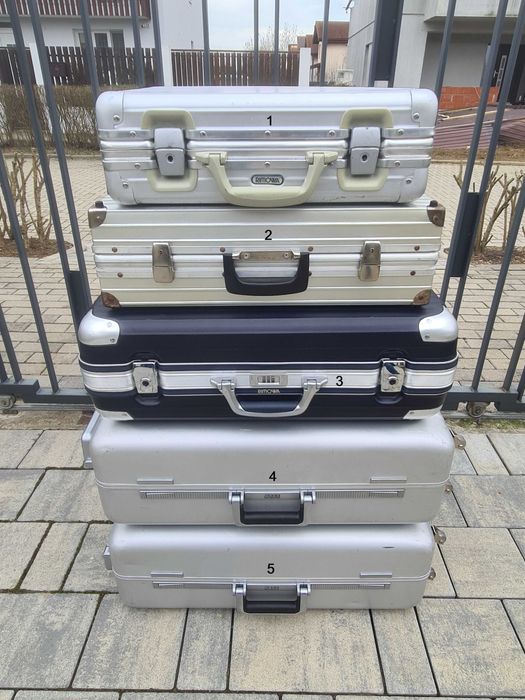 Geamantan troller troler valiza cufar Rimowa Zero Halliburton