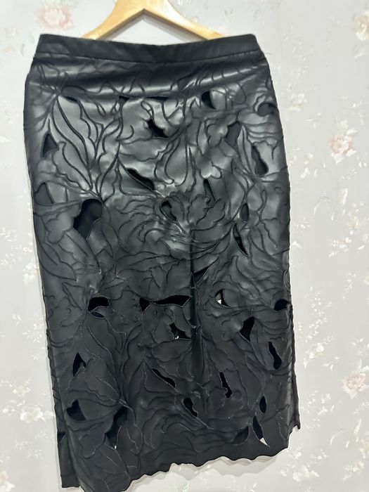 Юбки и жилетки от Massimo dutti