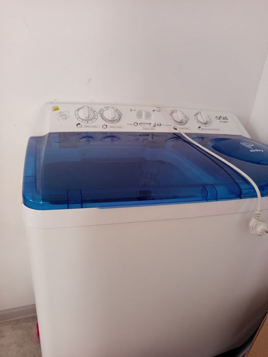 Продам стиральную машину 10 кг.в использовании 1 год.