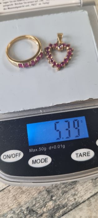 Комплект от висулка с рубини и пръстен с рубелити