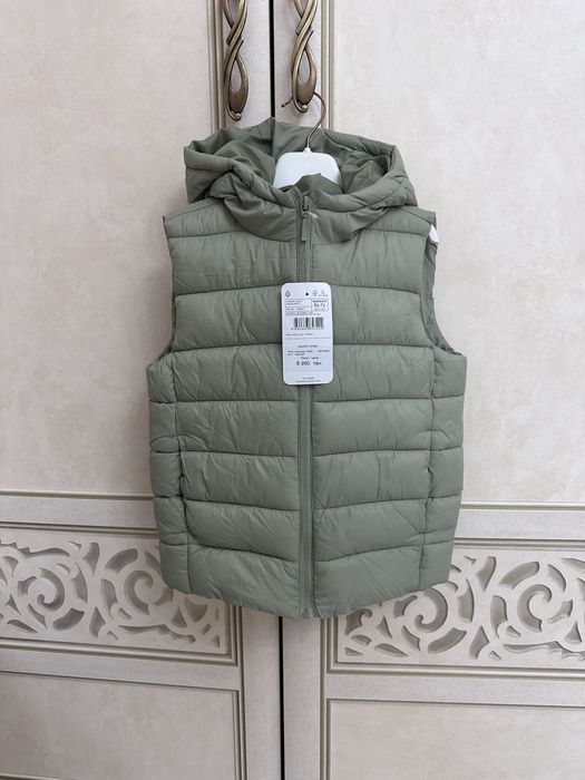 Жилет, безрукавка