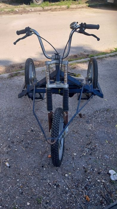 Триколка за пряг на кучета.