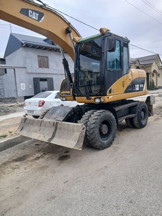 CAT M313D экскаватор сотилади
