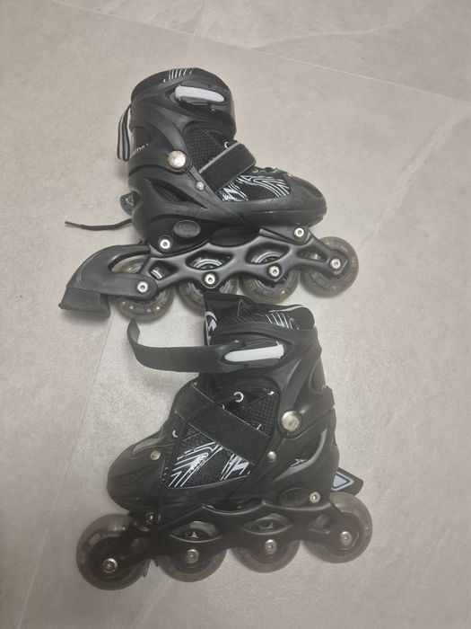 Роликовые коньки