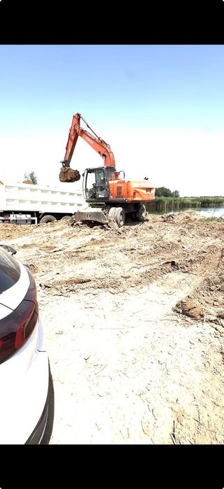 Услуги колесного Экскаватор