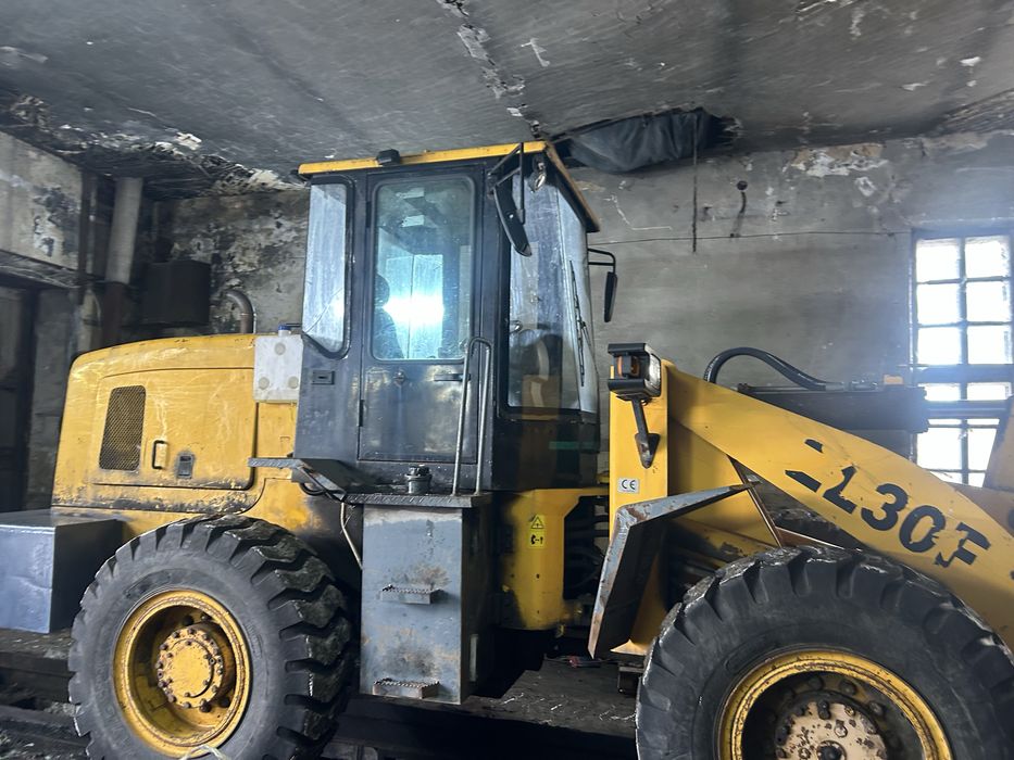 Погрузчик двух кубовый китай 2014