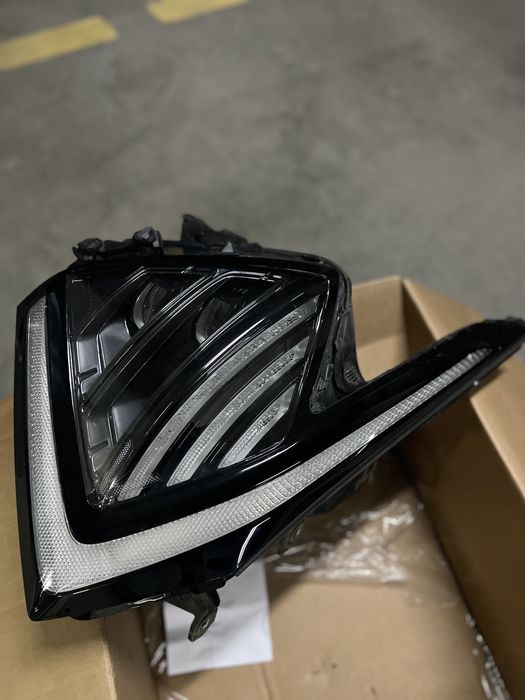 Фара Kia Sportage