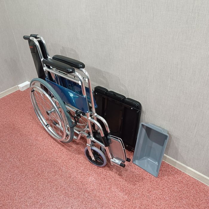 Кресло коляска с туалетом