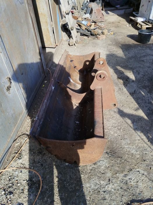 vand cupa taluz buldoexcavator caterpillar