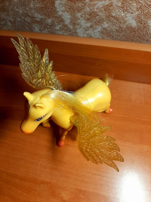 Детская игрушка лошадка