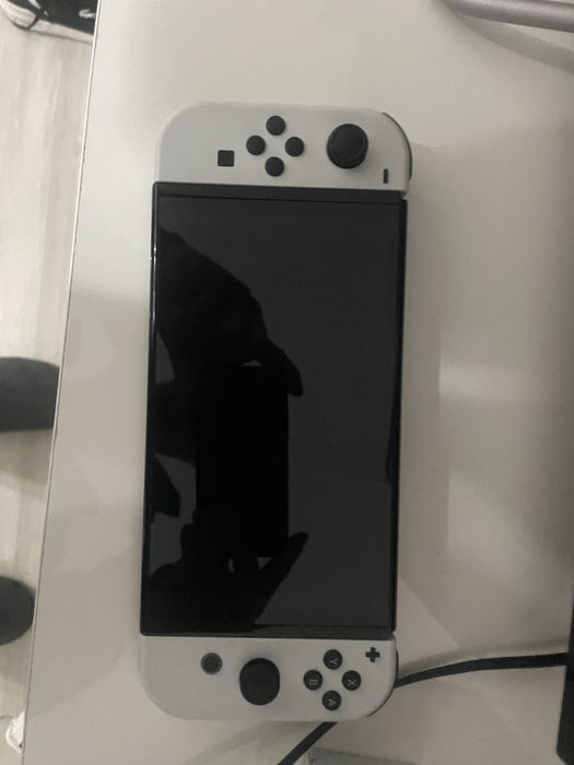 Vand nintendo switch oled cu mariokart deluxe