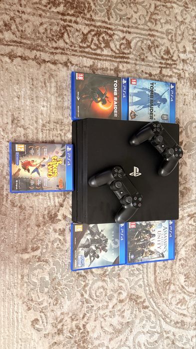 PlayStation 4 Pro 1TB + 2 controllere + jocuri – stare impecabilă