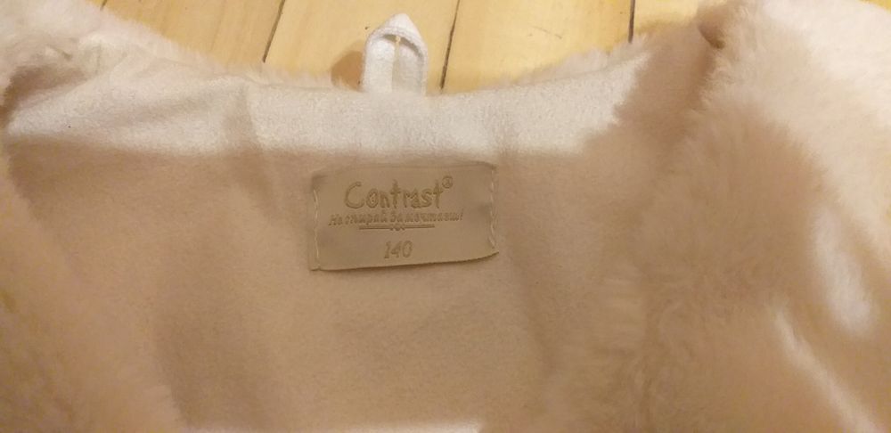 Пухен елек 140р.р на фирма Контраст