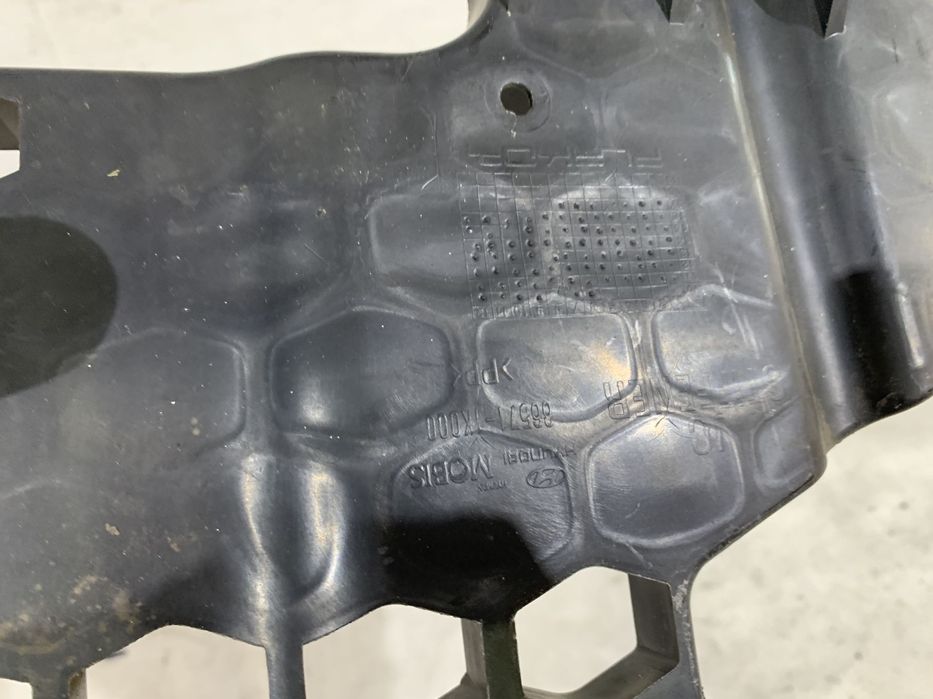 Inchidere inferioara Bara fata, Hyundai IX20, 2012, 2013, 2014, 2015, 2016, 2017, 2018, cod origine OE 86571-1K000.