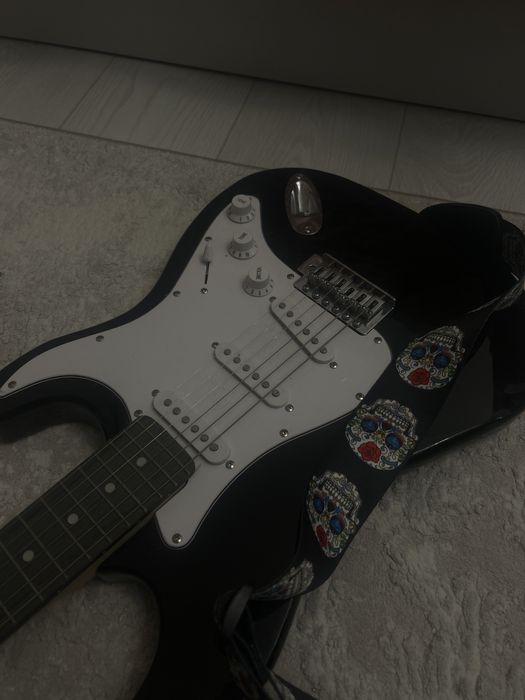 Электрогитара