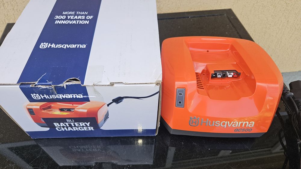 Incarcator husqvarna  qc500  nou