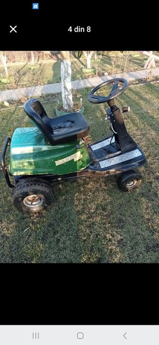Tractoras de tuns gazonul si de carat
